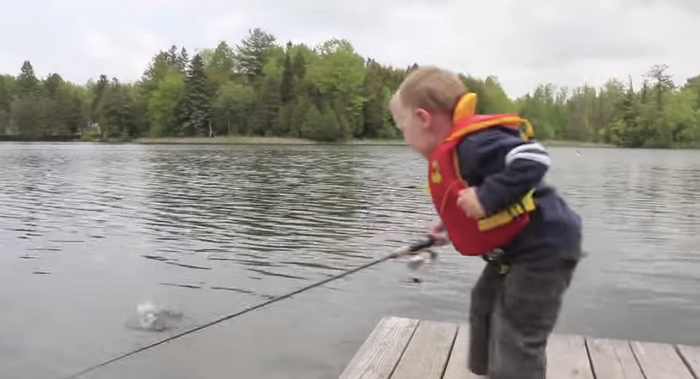 Boy Catches First Fish and His Reaction Is Priceless!