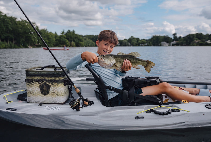 Close-up of a bass catch with the cooler on deck