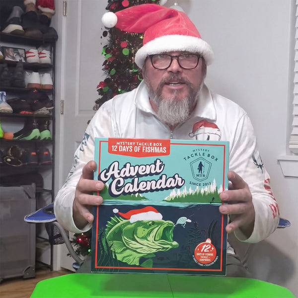 Angler holding a Fishmas catch 2