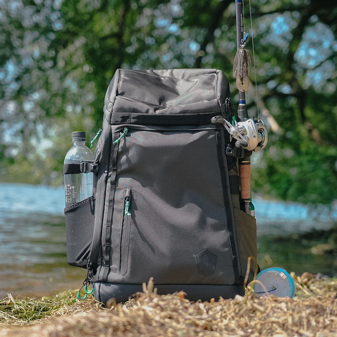 Charcoal Gray Lifestyle AnglerPack on bank