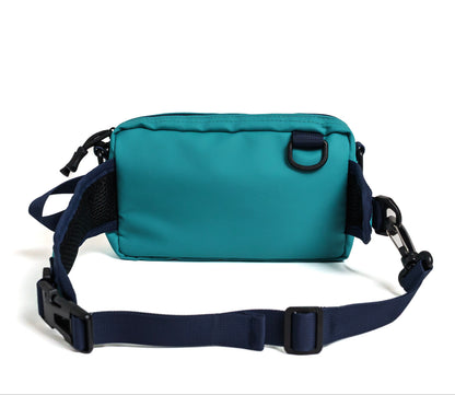 Teal waist bag with a black strap on a white background