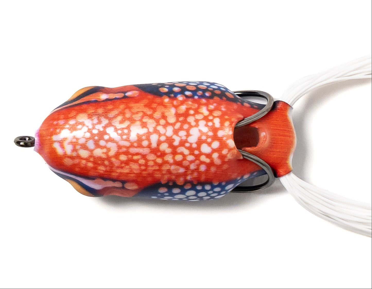 Colorful fishing lure with a white cord on a white background