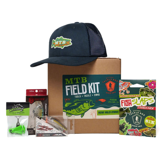 Fishing field kit with hat, box, and tackle items on a white background
